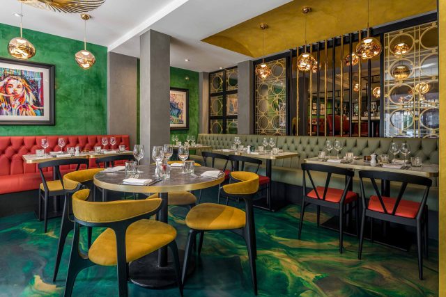Vibrant and relaxed restaurant atmosphere during Monday Steak Night at Aqua.